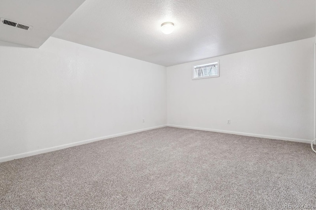 6508 S Garland Way, Littleton, CO 80123 - unfurnished room with carpet flooring and a textured ceiling