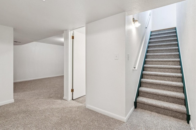 6508 S Garland Way, Littleton, CO 80123 - staircase featuring carpet floors and baseboards