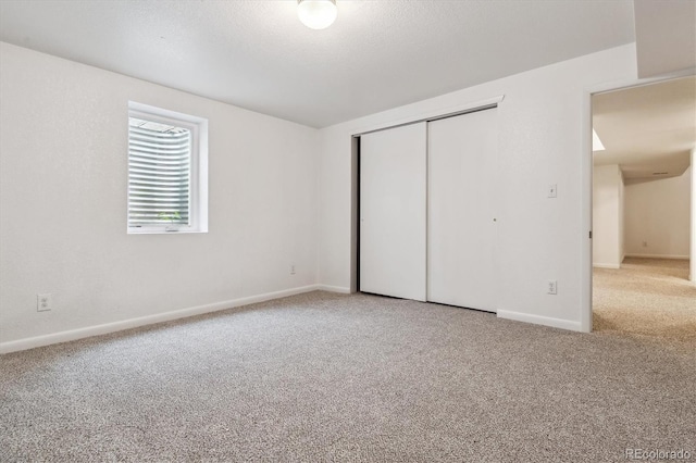6508 S Garland Way, Littleton, CO 80123 - unfurnished bedroom featuring carpet flooring and a closet