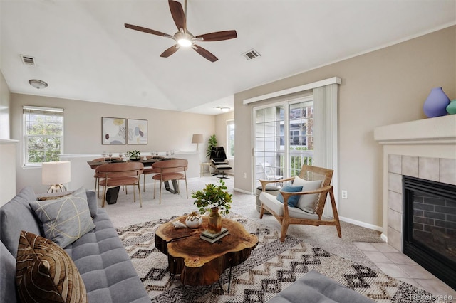 3262 E 103rd Dr Unit 1806, Thornton, CO 80229 - living room with a ceiling fan, a fireplace, baseboards, carpet floors, and vaulted ceiling