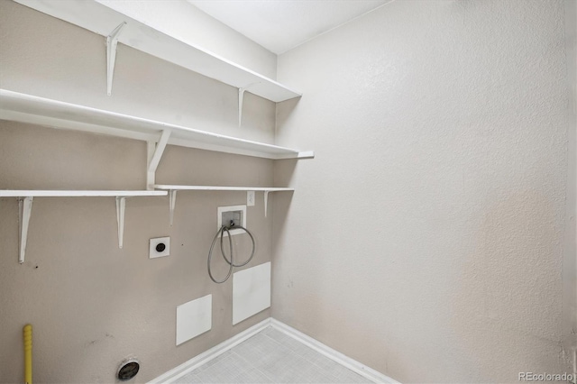 3262 E 103rd Dr Unit 1806, Thornton, CO 80229 - laundry room with hookup for a washing machine, baseboards, and hookup for an electric dryer