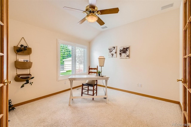 carpeted office featuring baseboards, visible vents, a ceiling fan, and lofted ceiling