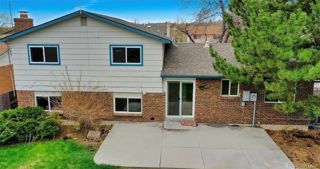 back of house with a patio area