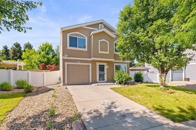 18672 E Chaffee Pl, Denver, CO 80249 - view of front of property with stucco siding, a garage, and concrete driveway