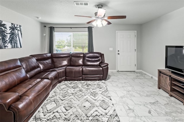18672 E Chaffee Pl, Denver, CO 80249 - living room with light marble finish flooring and ceiling fan
