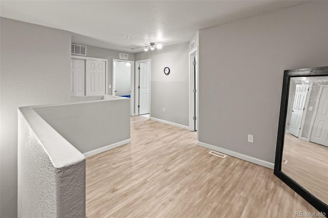 18672 E Chaffee Pl, Denver, CO 80249 - empty room featuring wood finished floors and baseboards