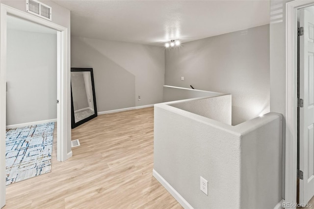 18672 E Chaffee Pl, Denver, CO 80249 - hall with an upstairs landing and light wood-type flooring