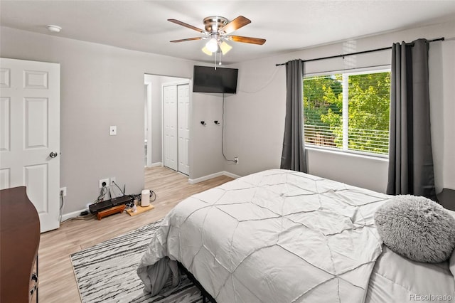 18672 E Chaffee Pl, Denver, CO 80249 - bedroom featuring light wood finished floors, a closet, and ceiling fan