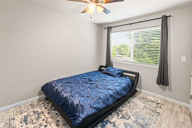 18672 E Chaffee Pl, Denver, CO 80249 - bedroom featuring wood finished floors and a ceiling fan