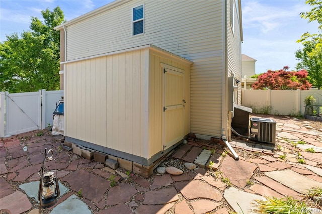 18672 E Chaffee Pl, Denver, CO 80249 - view of outdoor structure with a gate and a fenced backyard