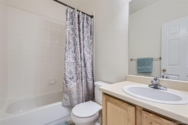 full bathroom featuring toilet, vanity, and shower / bathtub combination with curtain