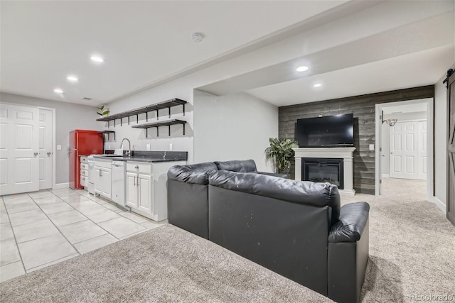 living room with light carpet and sink