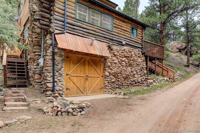 27403 Schuyler Gulch Rd, Pine, CO 80470 - view of outbuilding with stairway