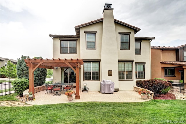 15160 W Iliff Pl, Lakewood, CO 80228 - rear view of house with a pergola, a chimney, stucco siding, and a patio