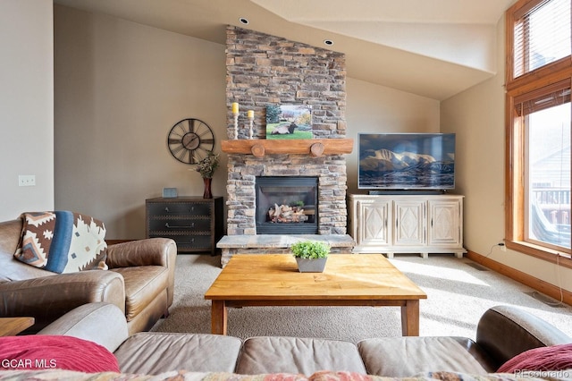 45 County Road 5223 Unit 25B, Tabernash, CO 80478 - living area with vaulted ceiling, carpet, plenty of natural light, and a fireplace