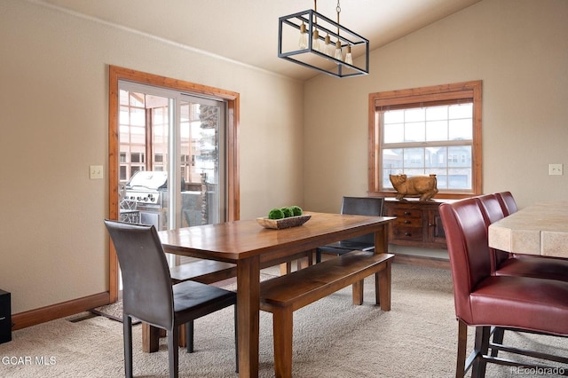 45 County Road 5223 Unit 25B, Tabernash, CO 80478 - dining area with light colored carpet, a chandelier, and lofted ceiling