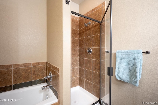 45 County Road 5223 Unit 25B, Tabernash, CO 80478 - bathroom featuring a shower stall and a bath