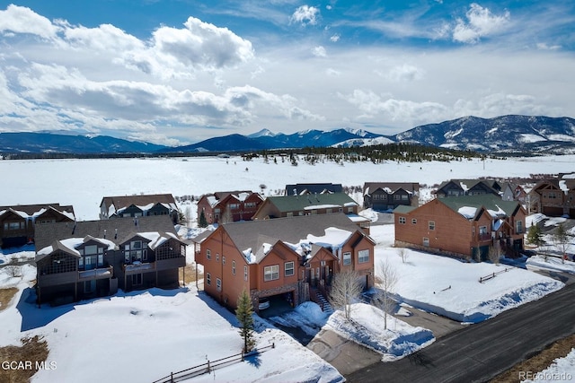 45 County Road 5223 Unit 25B, Tabernash, CO 80478 - snowy aerial view with a residential view and a mountain view
