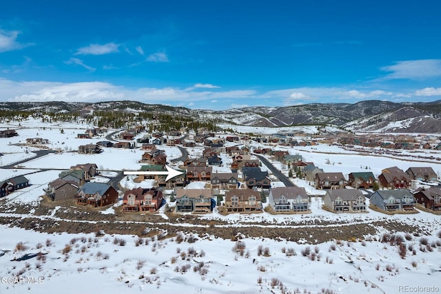 45 County Road 5223 Unit 25B, Tabernash, CO 80478 - snowy aerial view with a residential view and a mountain view
