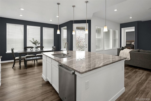 5128 Preserve Pl, Firestone, CO 80504 - kitchen featuring stainless steel dishwasher, dark wood-style flooring, recessed lighting, white cabinets, and hanging light fixtures