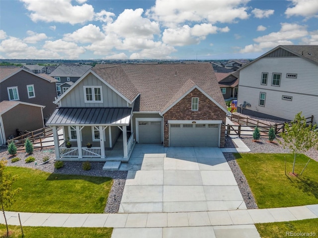 5128 Preserve Pl, Firestone, CO 80504 - view of front of property featuring board and batten siding, covered porch, an attached garage, concrete driveway, and a shingled roof