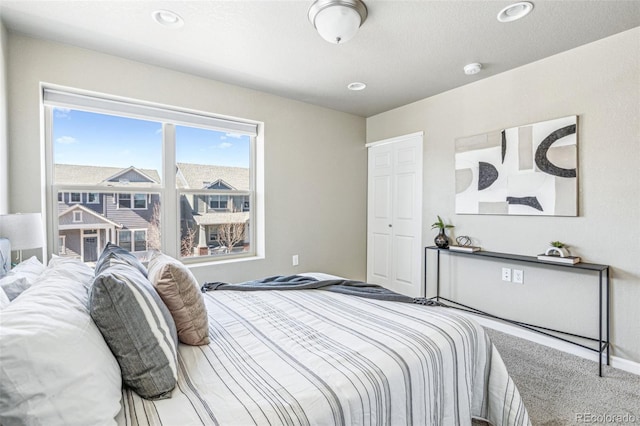 bedroom featuring carpet and recessed lighting