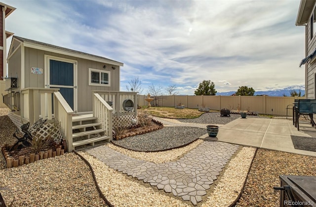 view of yard featuring a patio and a fenced backyard