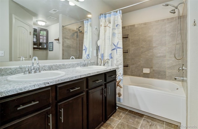 bathroom with a sink, visible vents, shower / tub combo with curtain, and double vanity