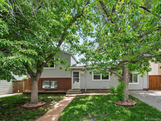 4858 S Quintero Cir, Aurora, CO 80015 - split level home featuring brick siding