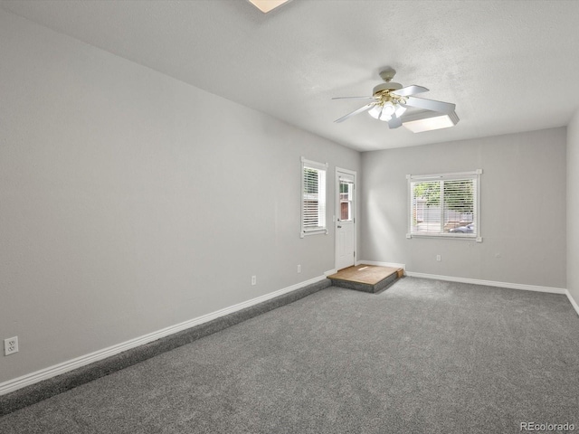 4858 S Quintero Cir, Aurora, CO 80015 - spare room featuring baseboards, ceiling fan, and carpet floors