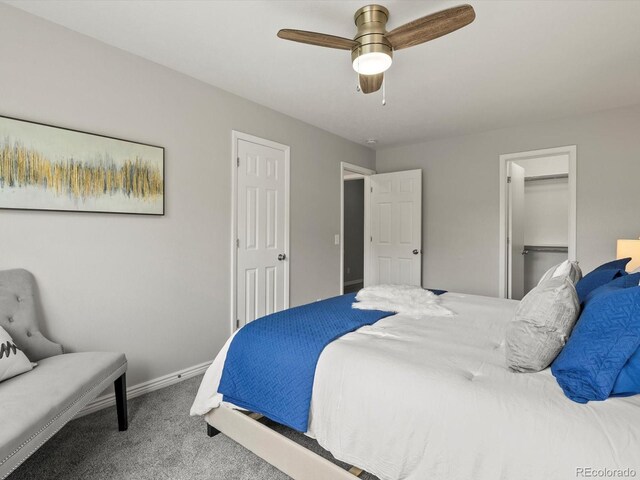 4858 S Quintero Cir, Aurora, CO 80015 - carpeted bedroom featuring baseboards, ceiling fan, and a closet