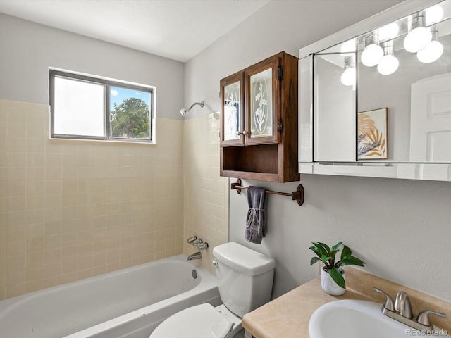 4858 S Quintero Cir, Aurora, CO 80015 - full bathroom featuring toilet, washtub / shower combination, and vanity