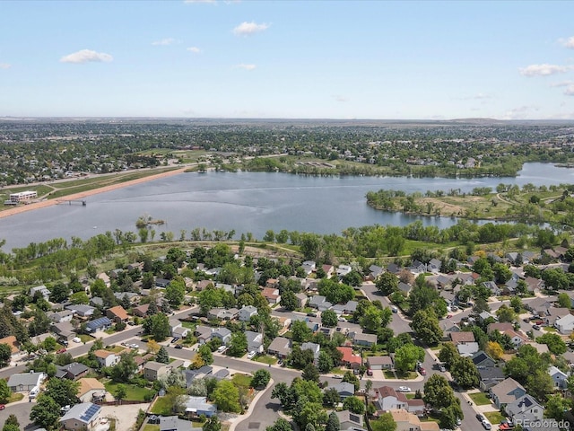 4858 S Quintero Cir, Aurora, CO 80015 - aerial perspective of suburban area featuring a nearby body of water