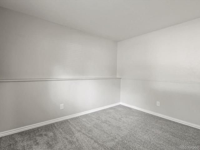 4858 S Quintero Cir, Aurora, CO 80015 - carpeted empty room with baseboards