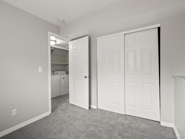 4858 S Quintero Cir, Aurora, CO 80015 - unfurnished bedroom with washing machine and dryer, carpet flooring, a closet, and baseboards