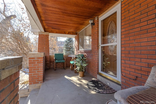 view of snow covered patio