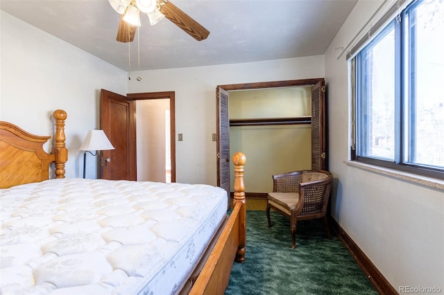 carpeted bedroom with ceiling fan and a closet