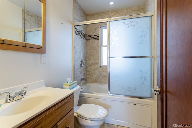 full bathroom with toilet, enclosed tub / shower combo, and vanity