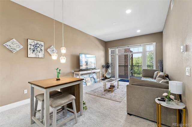6000 W Floyd Ave Unit 214, Denver, CO 80227 - living area with carpet floors and recessed lighting