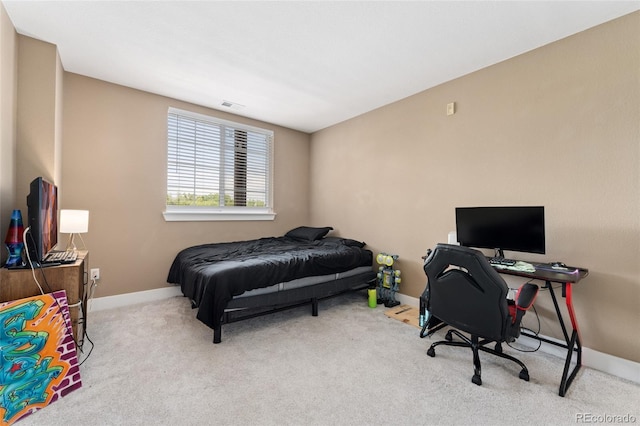 6000 W Floyd Ave Unit 214, Denver, CO 80227 - carpeted bedroom featuring baseboards and an office area