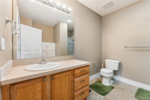 6000 W Floyd Ave Unit 214, Denver, CO 80227 - bathroom with vanity and toilet