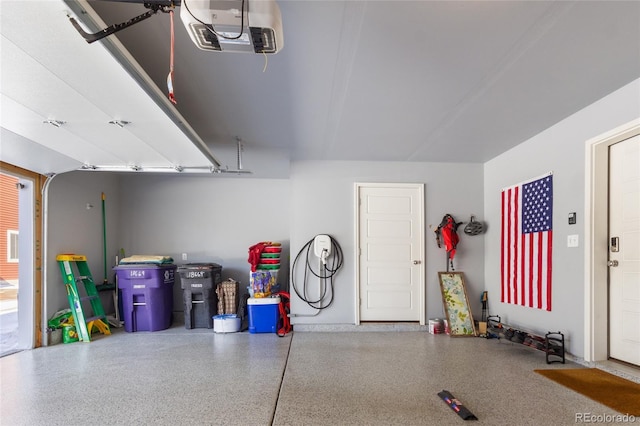 garage featuring a garage door opener