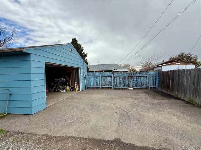 detached garage with fence