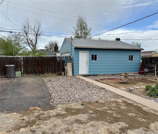garage with fence