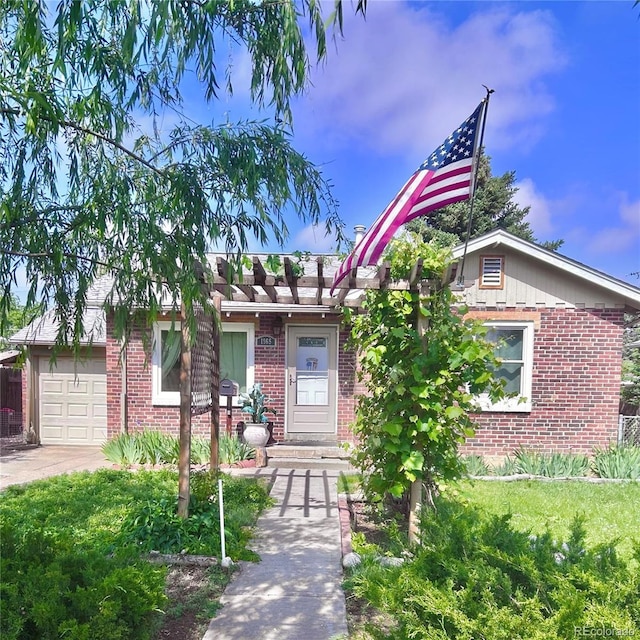 1965 Havana St, Aurora, CO 80010 - view of front of property featuring brick siding and a garage