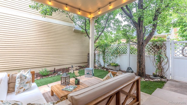 8367 Devinney St, Arvada, CO 80005 - view of patio featuring an outdoor hangout area, a gate, and a deck