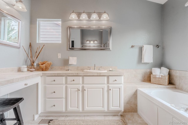 8367 Devinney St, Arvada, CO 80005 - bathroom featuring a bath, vanity, and tile patterned floors