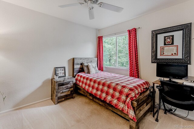 8367 Devinney St, Arvada, CO 80005 - bedroom with light carpet and a ceiling fan