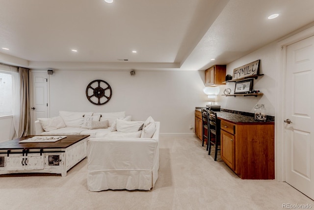 8367 Devinney St, Arvada, CO 80005 - living area with light carpet, recessed lighting, and baseboards