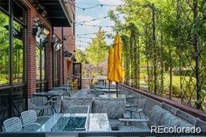 8367 Devinney St, Arvada, CO 80005 - view of patio / terrace featuring outdoor lounge area